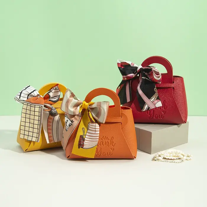 Mini sacs cadeaux de pâques en cuir avec ruban à nœud