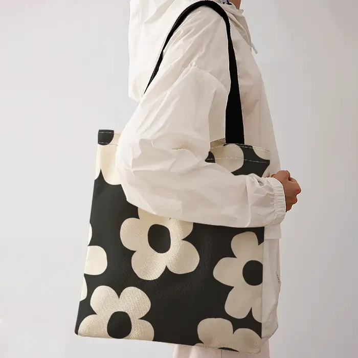 Sac fourre-tout à imprimé floral simple beige sur fond noir