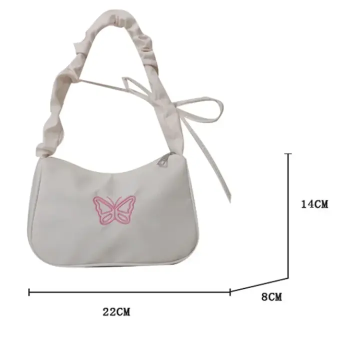 Sac à bandoulière brodé avec nœud papillon