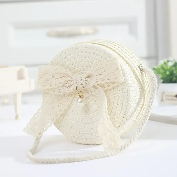 Mini sac en paille avec nœud en dentelle