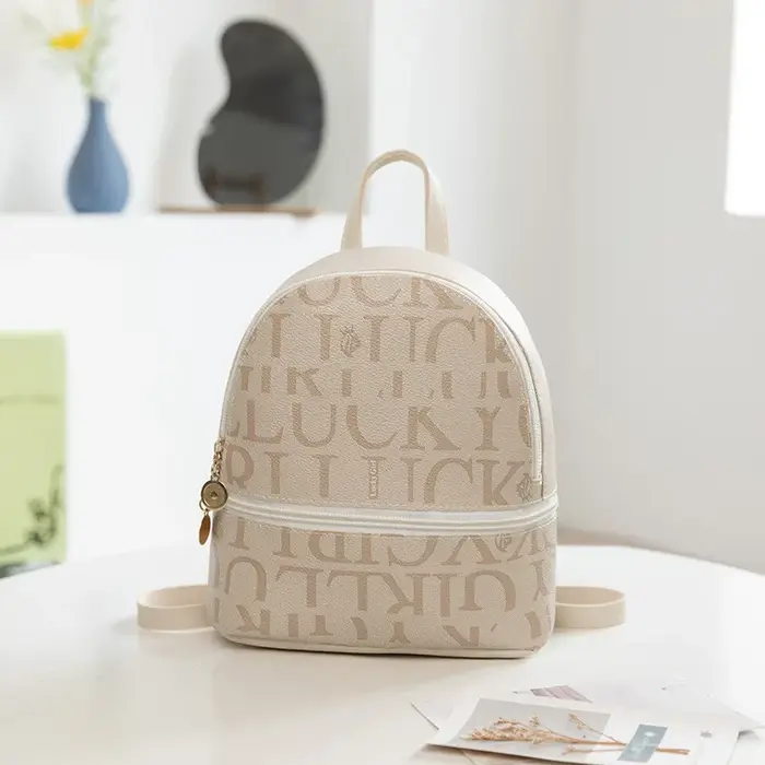 Mini sac à dos mode rétro sac à bandoulière petit mignon sac à main en cuir PU petit sac à dos pour