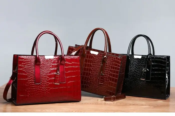 Sac à main en cuir verni pour femme
