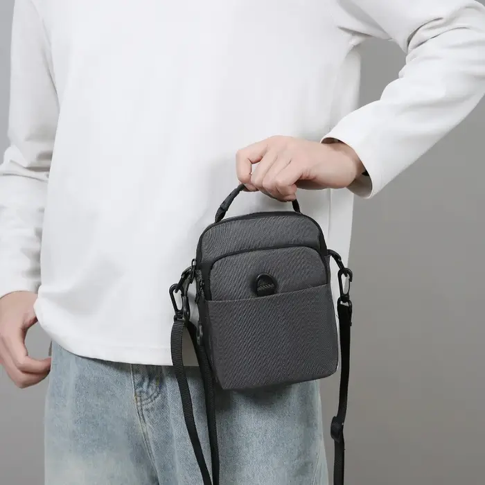 Sac bandoulière homme multi-poches en tissu Oxford – Pochette compacte pour voyage et trajets quotidiens