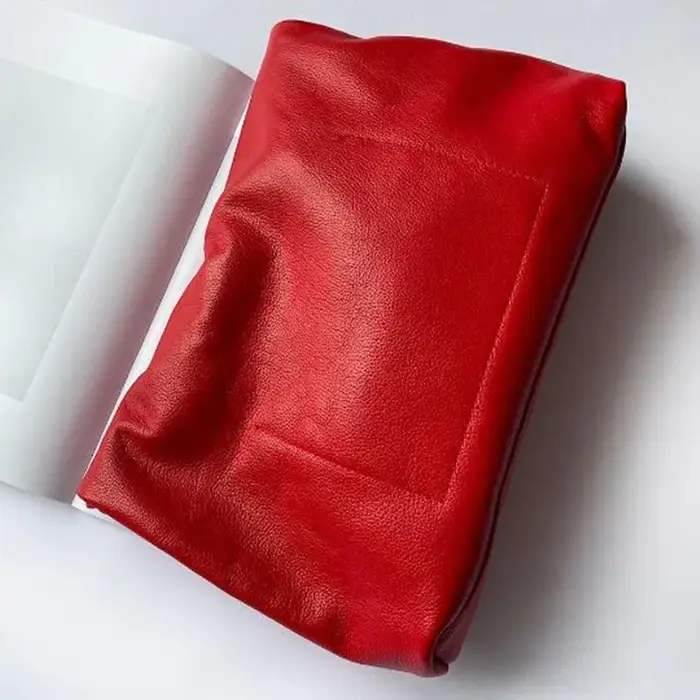 Sac en cuir souple à bords roulants pour femme