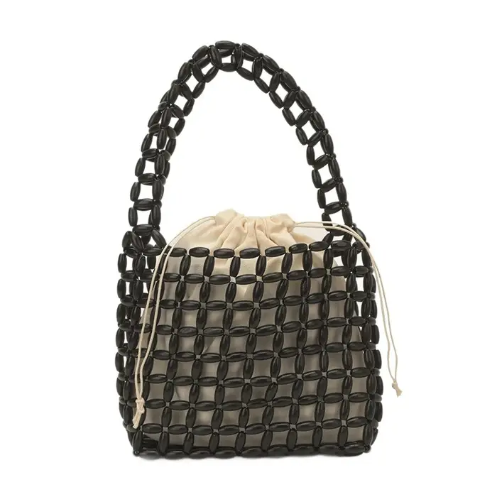 Sac à main tressé en perles de bois fait main
