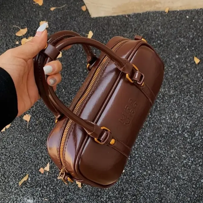 Sac bowling élégant en cuir PU