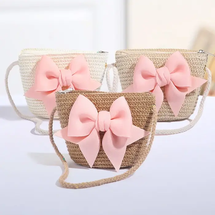 Sac à bandoulière rose avec nœud papillon pour fille