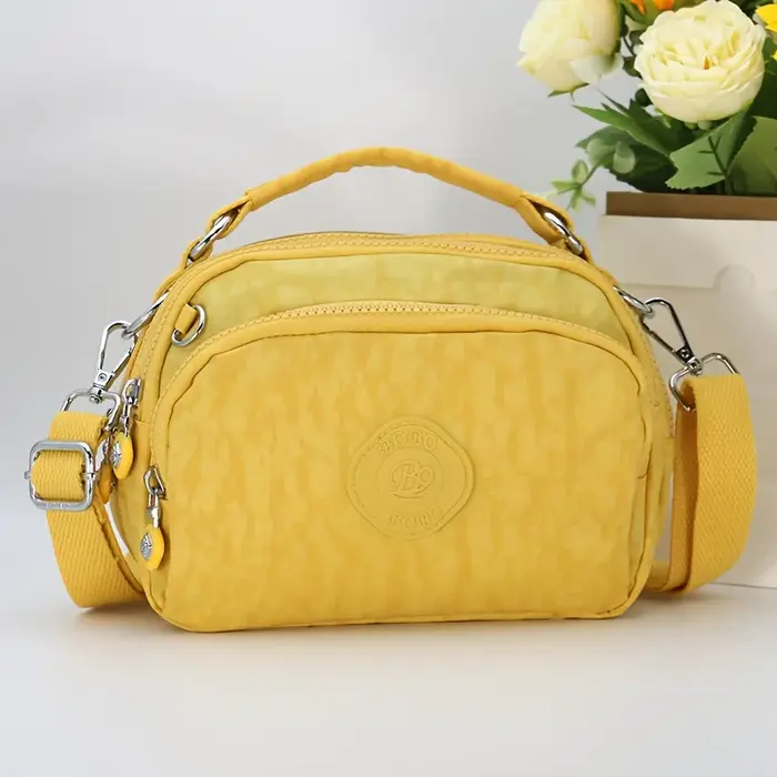 Sac à bandoulière en nylon multi-poches pour femme