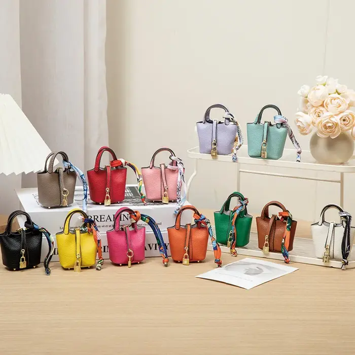 Nouveau Mini maison petit sac en cuir Portable main corde Bluetooth écouteur sac zéro portefeuille multi fonctionnel