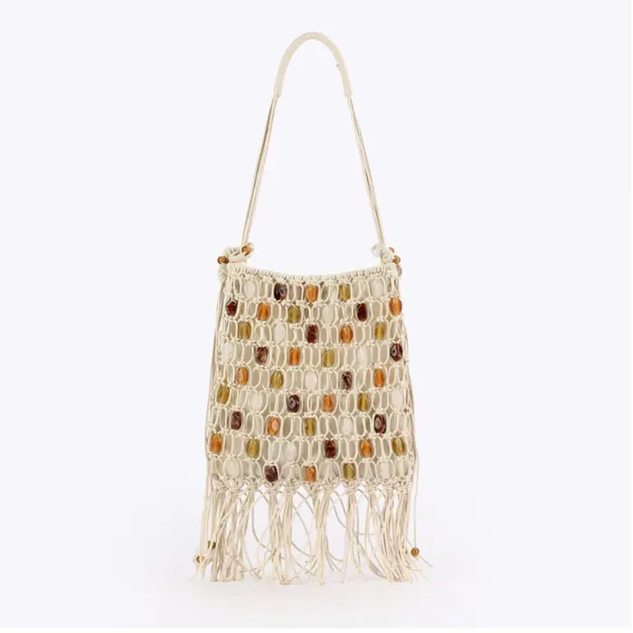 Sac à bandoulière perlé à pompons