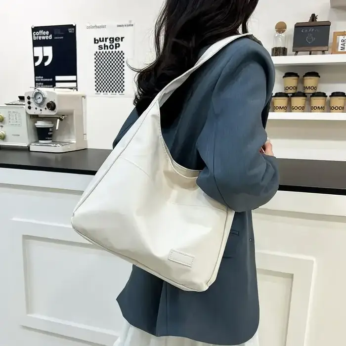 Sac à bandoulière en cuir PU souple pour femme avec poche
