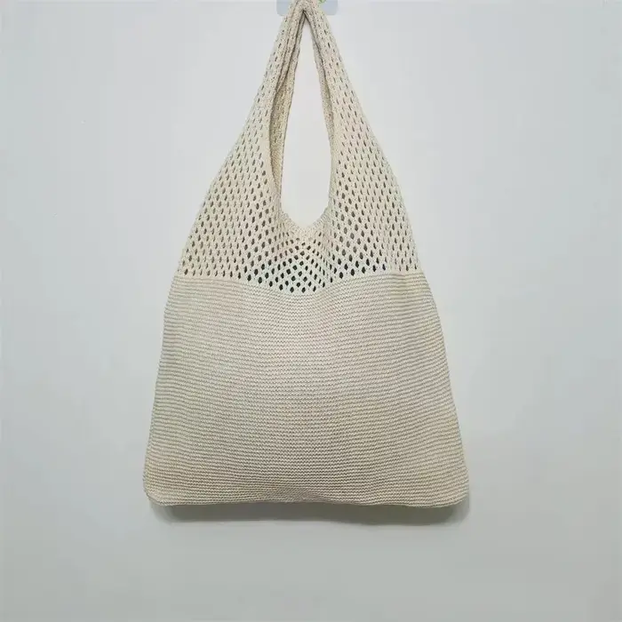 Sac fourre-tout en laine tricoté de couleur unie