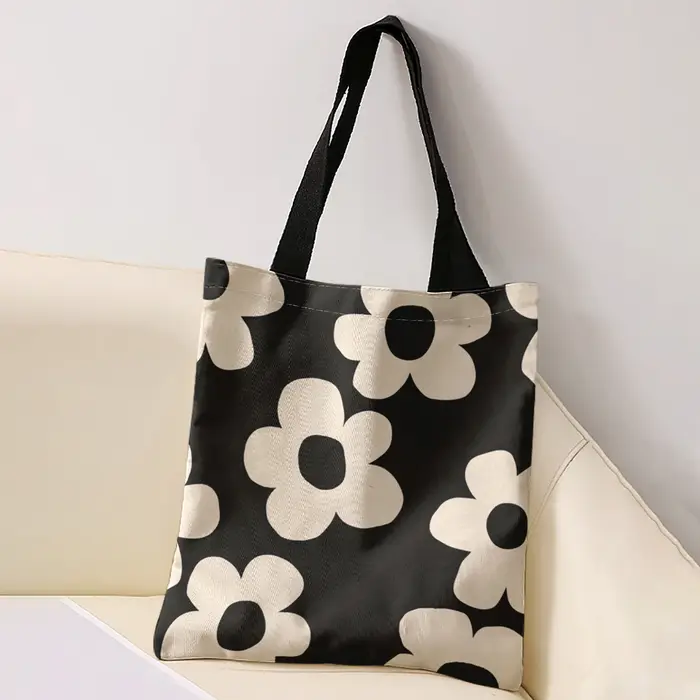 Sac fourre-tout à imprimé floral simple beige sur fond noir