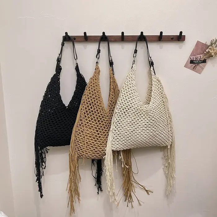 2025 nouveau sac de plage en paille de créateur pour les femmes mode gland sac à main fourre-tout sac de vacances décontracté dame Crochet évider sac à bandoulière