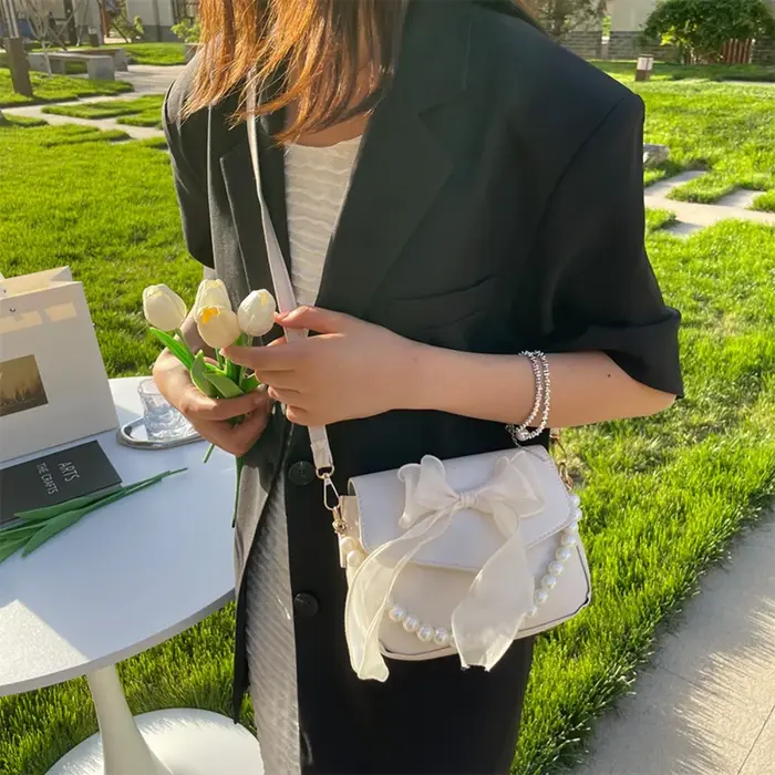 Sac à main en toile avec nœud papillon pour femme
