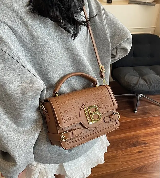 Sac à langer classique : Sac fourre-tout élégant en cuir grande capacité pour femme