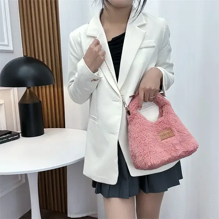 Pochette Hobos en fausse laine d'agneau pour femme