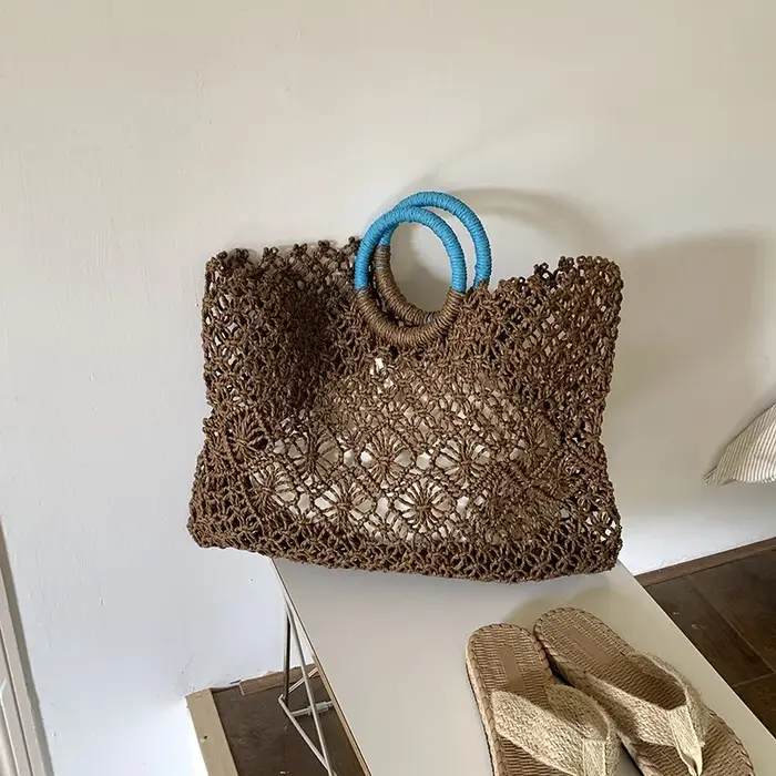 Sac de voyage en raphia et rotin