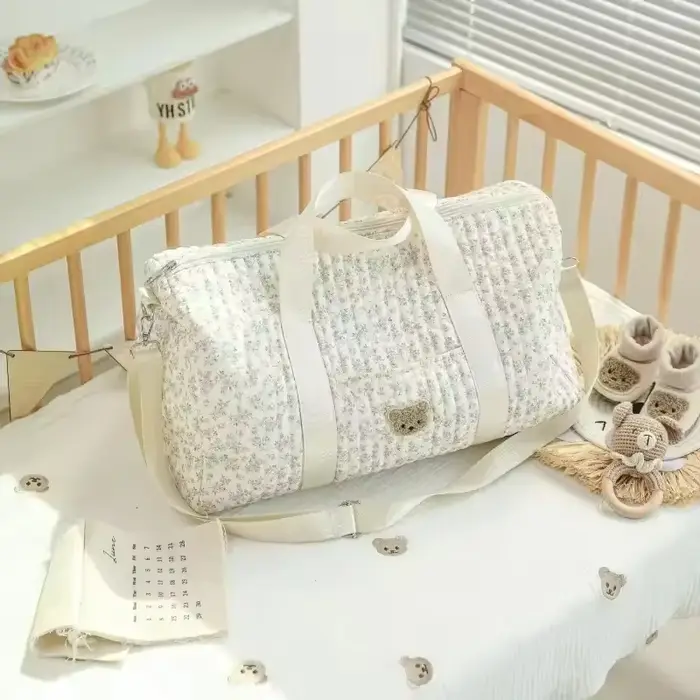 Sacs à couches sacs à couches pour maman sac fourre-tout de grande capacité sac de créateur de luxe sac à couches d'activité de messager florale mère et bébé