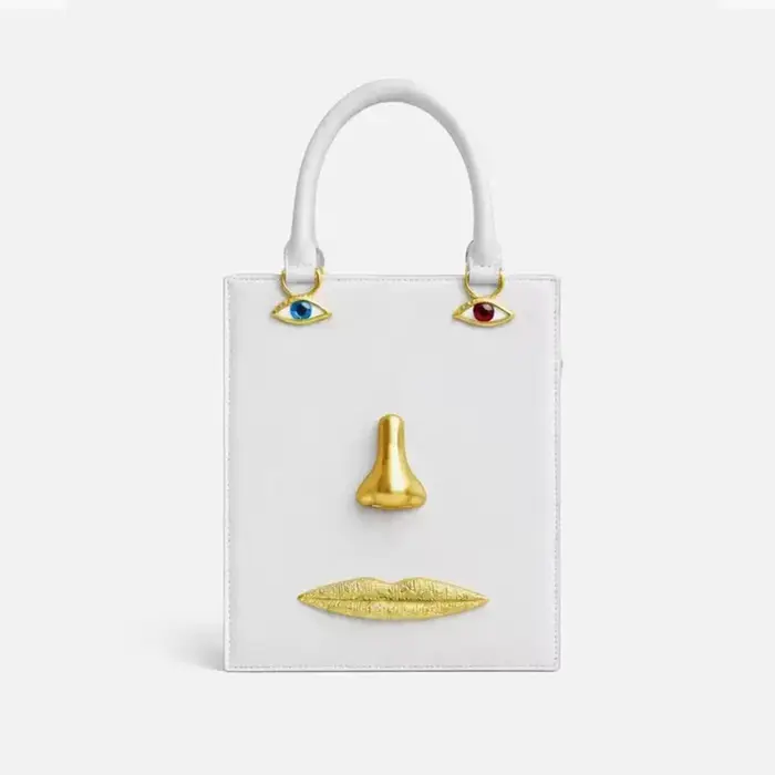 Sac à main pour femme en cuir noir de haute qualité, de marque de luxe, avec bijoux yeux et bandouli