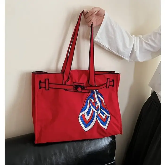 Sac à bandoulière brodé créatif 2026 pour femme