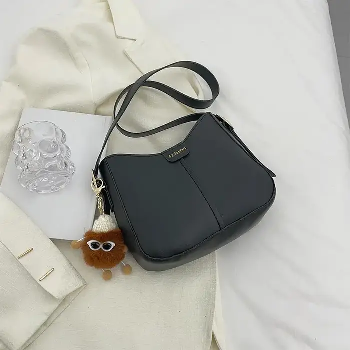 Sac seau confortable et polyvalent avec design ergonomique pour les voyageurs