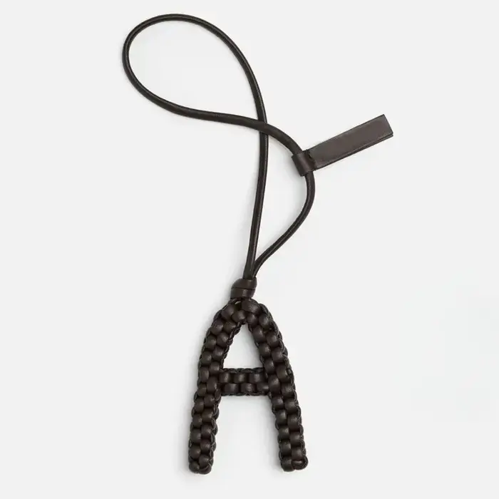 Breloque de sac en cuir tressé pour femme, pendentif décoratif de luxe en cuir tissé à la main, acce