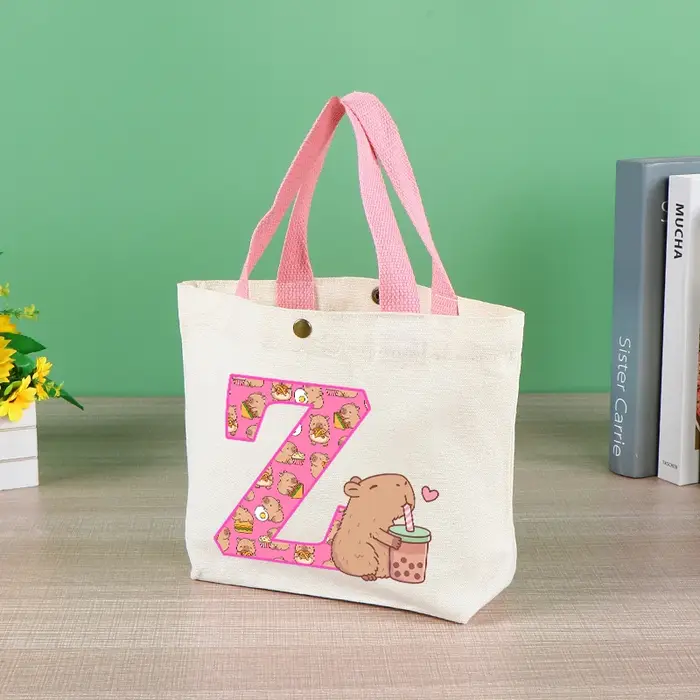 Capibara mignon sac fourre-tout pour femmes Anime Capybara lettre A-Z sac à main filles Shopping voyage organiser toile pochette cadeau offres spéciales