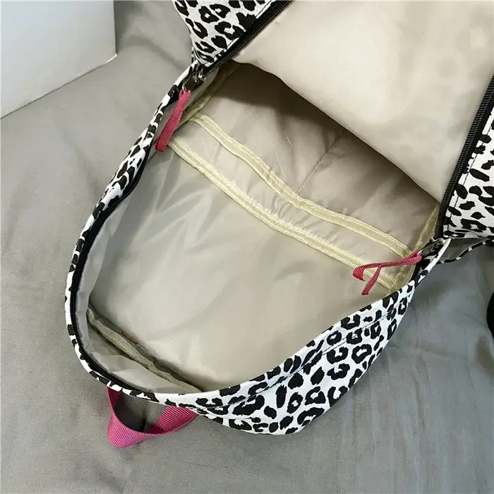 Sac à dos décontracté en toile à imprimé léopard pour femme