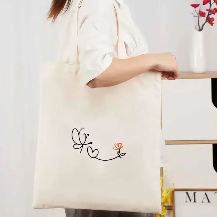 Sac à main en toile crème avec motif papillon, cœur et fleur, pour un usage quotidien, le shopping e