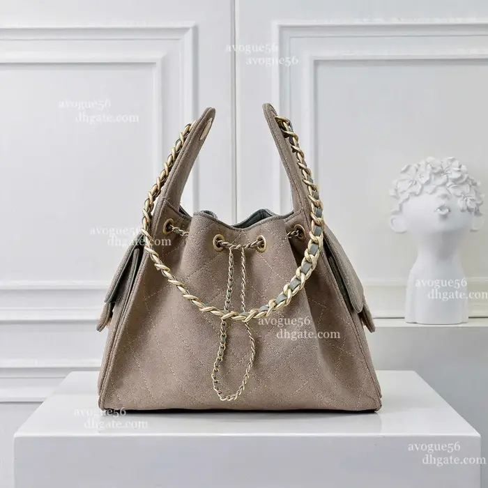 Sac à bandoulière de créateur en cuir caviar 25, style seau, hobo, sous le bras, en suède, matelassé