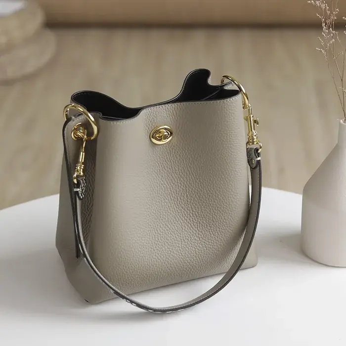 Nouveau 2026 élégant exquis seau fourre-tout en cuir de vache véritable femmes sac à main 2 poches p