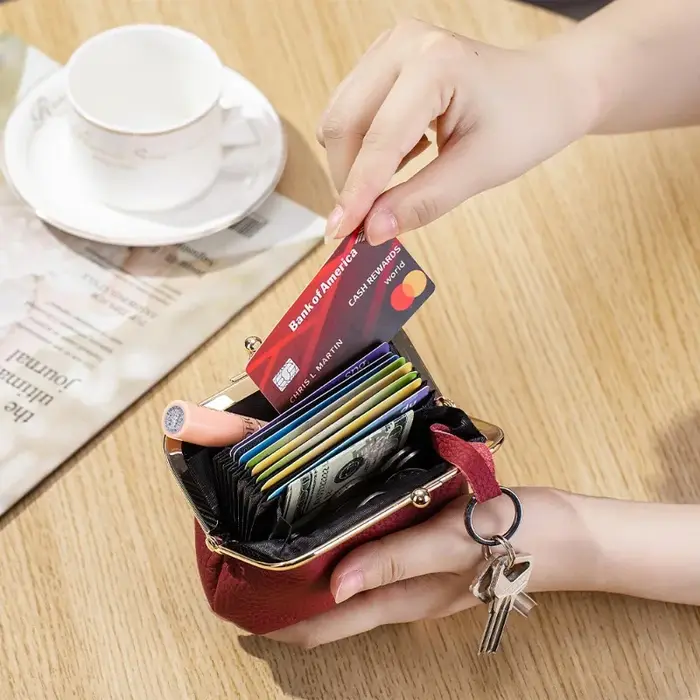 Mini portefeuille Kiss-lock en cuir véritable