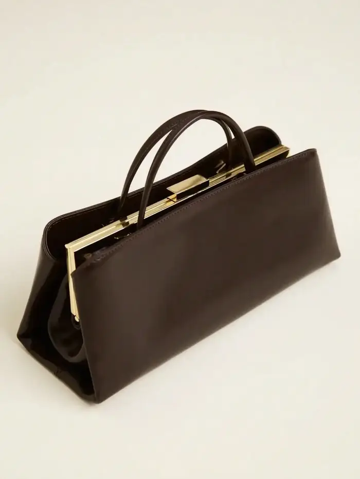 Femmes cadre fermoir pochette épaule baguette sac fourre-tout sac à main 2025 hiver nouveau polyvalent français sac café noir blanc cassé couleur
