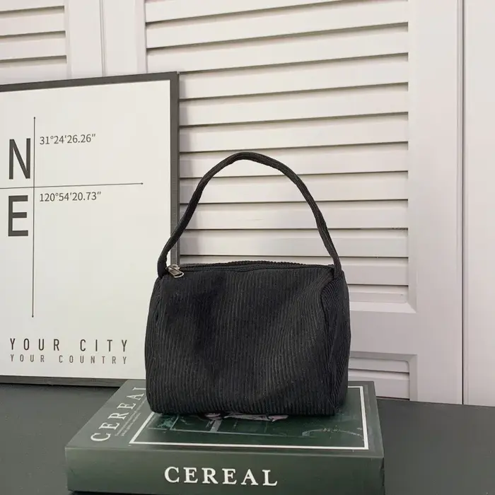 Sac carré compact à porter à la main