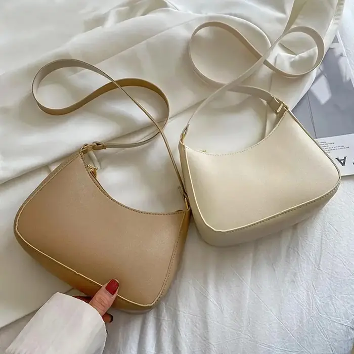 Sac à main tendance et élégant de couleur unie