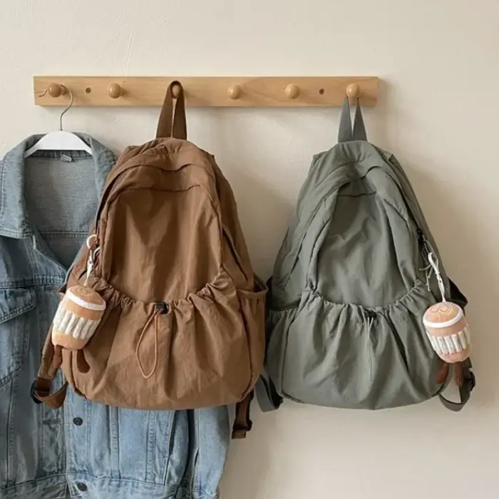 2025 sac à dos décontracté femmes grande capacité mode Junior lycée étudiant pli cartable sac en tissu coréen voyage sac à dos
