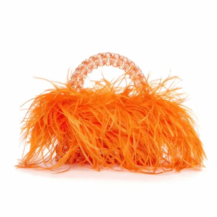 Sac à main en perles avec plumes et fourrure