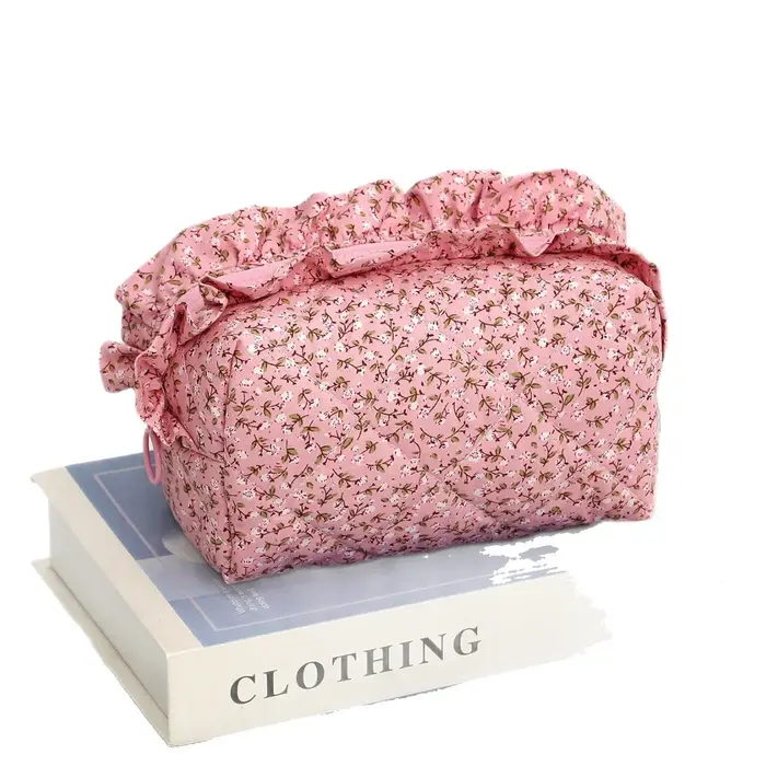 Trousse de maquillage en dentelle avec nœud