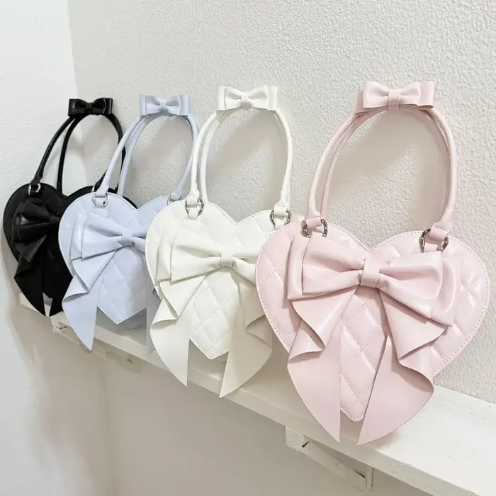Sacs à main originaux en forme de cœur avec nœud