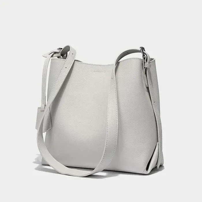2025 Beige bleu couleur unie Design Simple sac seau en cuir de vachette femmes sac à bandoulière de 