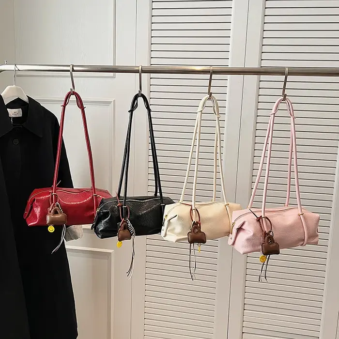 Sac à bandoulière cylindrique en similicuir froissé pour femme