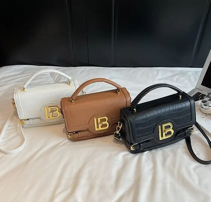 Sac à langer classique : Sac fourre-tout élégant en cuir grande capacité pour femme