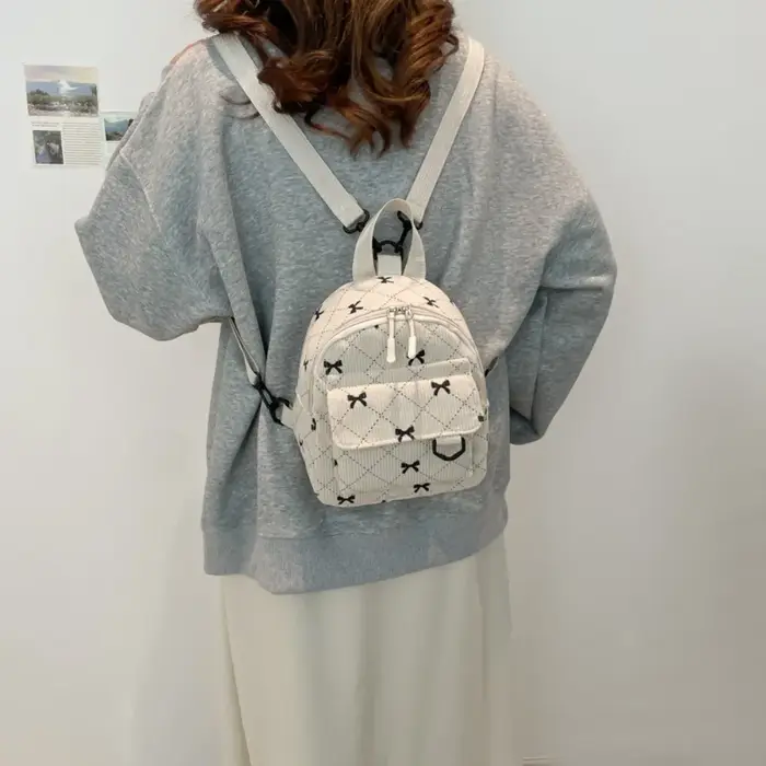 Mini sac à dos doux fille nœud papillon imprimé sac à bandoulière voyage sac de rangement cosmétique Version coréenne Ins Bookbags sac à dos décontracté