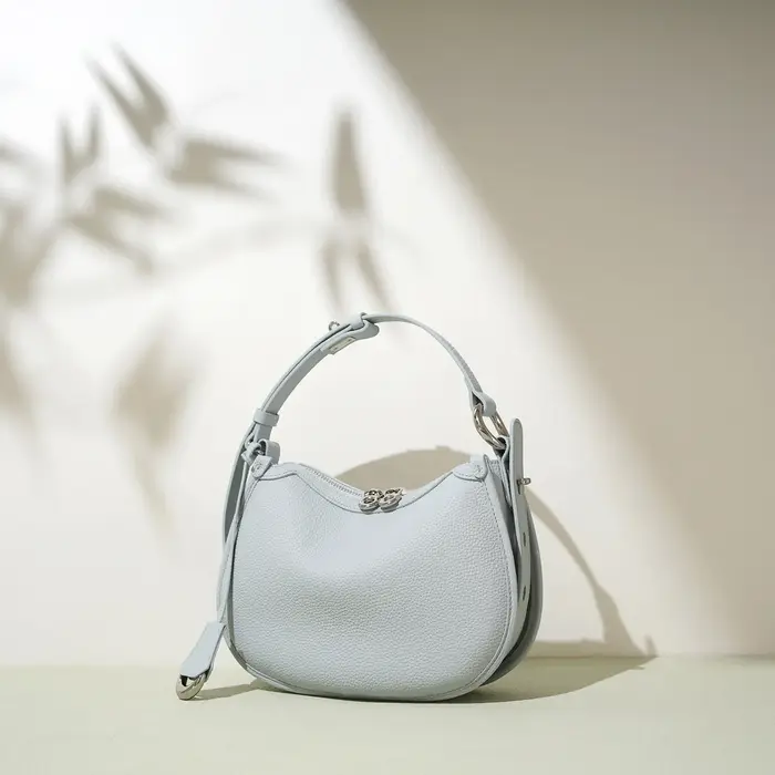 Sac à rabat de selle pour femmes, Design rond de couleur bleue, sac à bandoulière en cuir de vache d