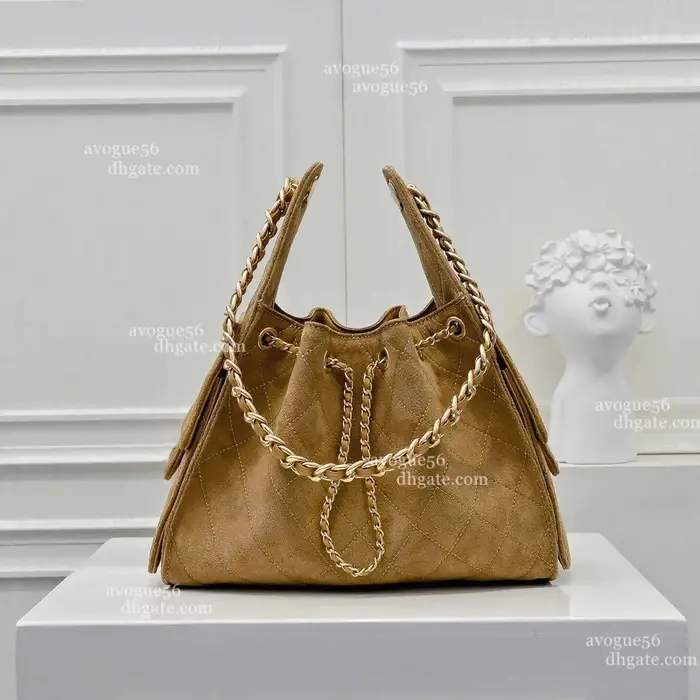 Sac à bandoulière de créateur en cuir caviar 25, style seau, hobo, sous le bras, en suède, matelassé