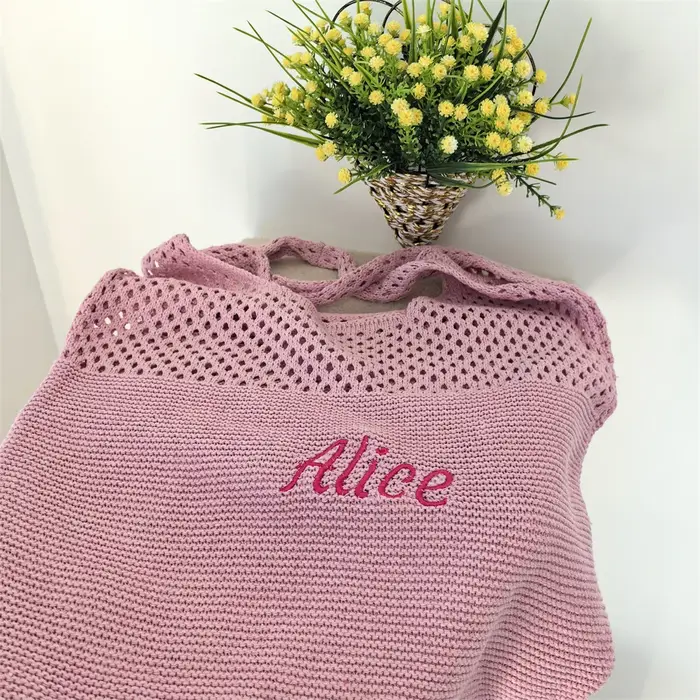 Sac fourre-tout en laine tricoté de couleur unie