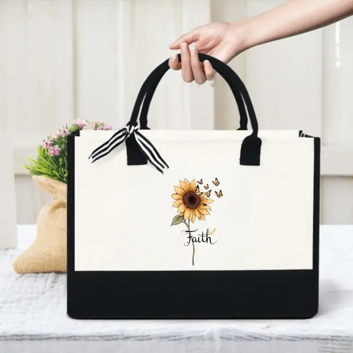 Sac à main en toile de tournesols crème et noirs au design papillon et foi pour un usage quotidien