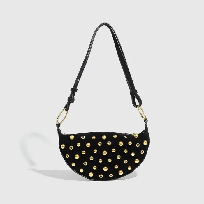 Sac à bandoulière clouté de styliste
