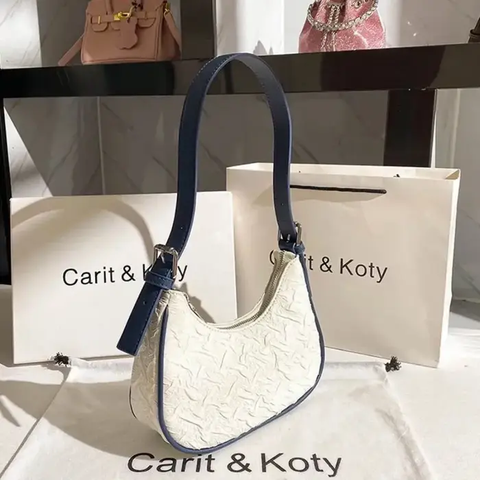 Sac plissé tendance de l'année, design original et raffiné, sac croissant pour femme, design de niche estival, sac porté épaule